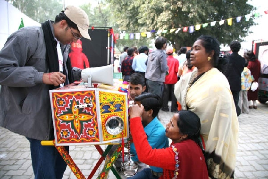 Visitors looking into a bioscope at the ArtMoves debut