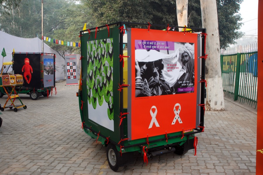 Artwork by AIDS activists displayed on an ArtMoves auto-rickshaw