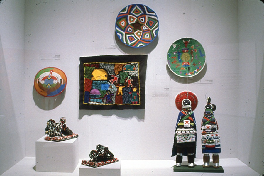 Beaded tableaux, textiles, and telephone-wire baskets