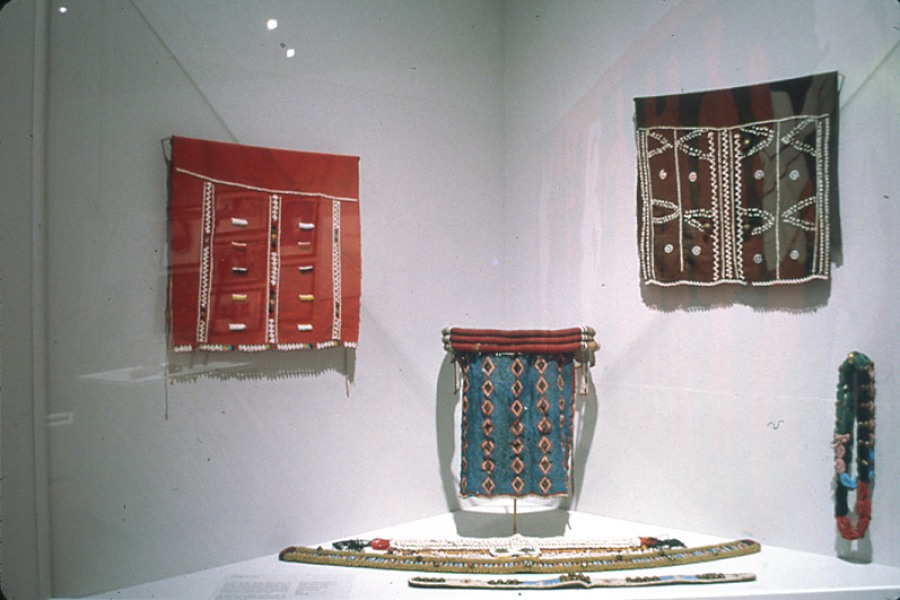 Zulu beadwork, painted panels, and telephone-wire baskets displayed in the exhibition