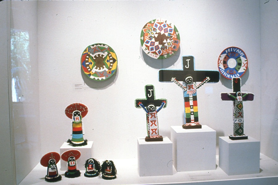 Beaded Crucifixion sculptures and telephone-wire baskets
