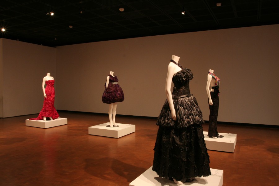 Adriana Bertini’s Condom Couture garments under dramatic lighting