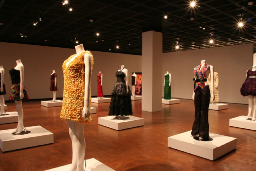 Adriana Bertini’s Condom Couture garments under dramatic lighting