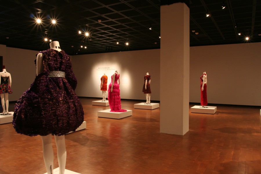 Adriana Bertini’s Condom Couture garments under dramatic lighting