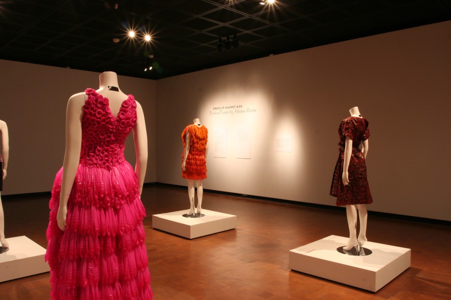 Adriana Bertini’s Condom Couture garments under dramatic lighting