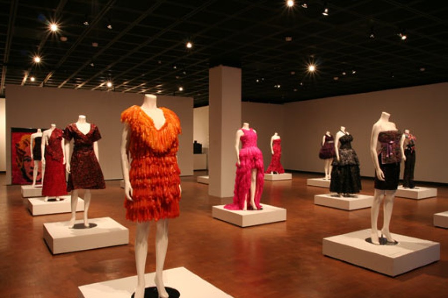 Adriana Bertini’s Condom Couture garments under dramatic lighting
