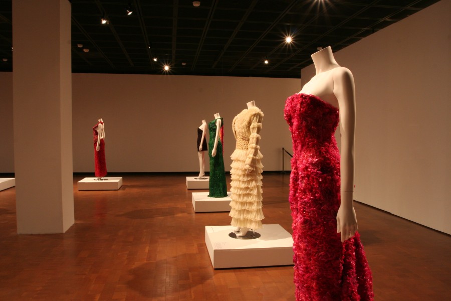 Adriana Bertini’s Condom Couture garments under dramatic lighting