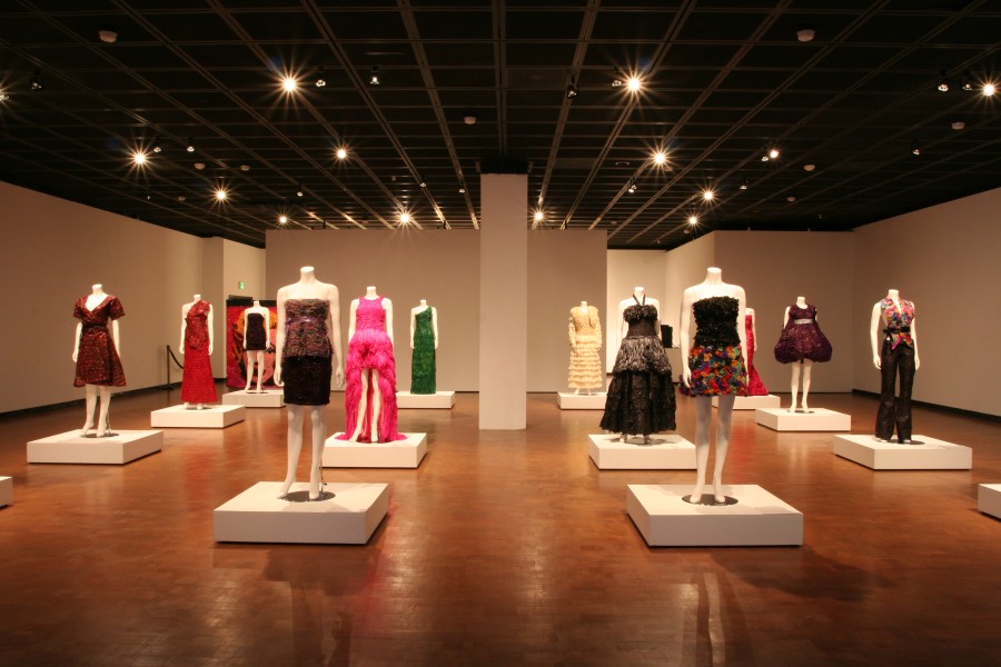 Adriana Bertini’s Condom Couture garments under dramatic lighting
