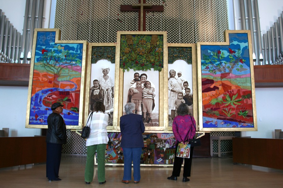 Audience viewing the fully opened Keiskamma Altarpiece at Holman United Methodist Church