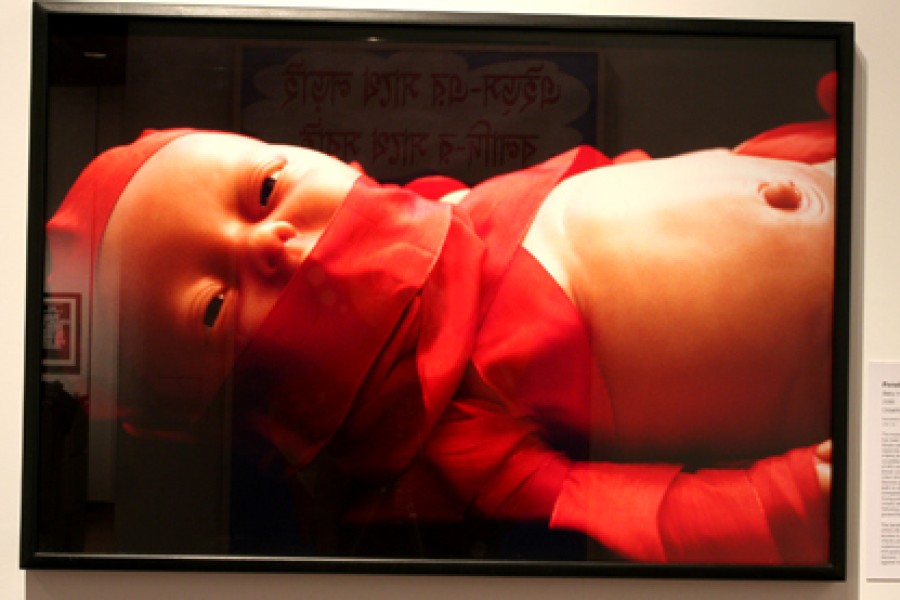 "Baby in Red" by Penelope Siopis