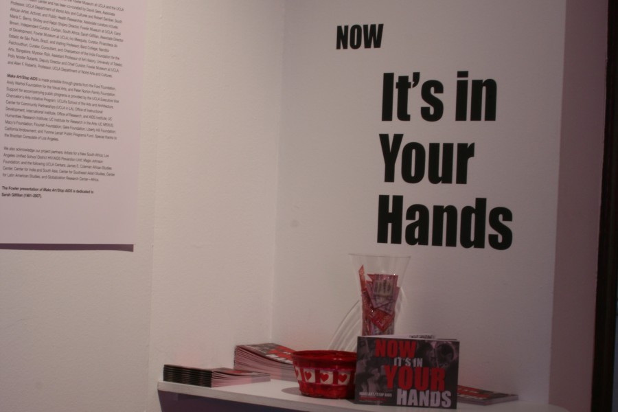 Exhibition exit displaying “NOW It's in Your Hands”