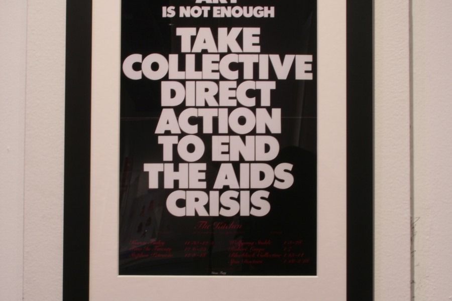 Gran Fury’s poster *Art Is Not Enough* displayed in the exhibition