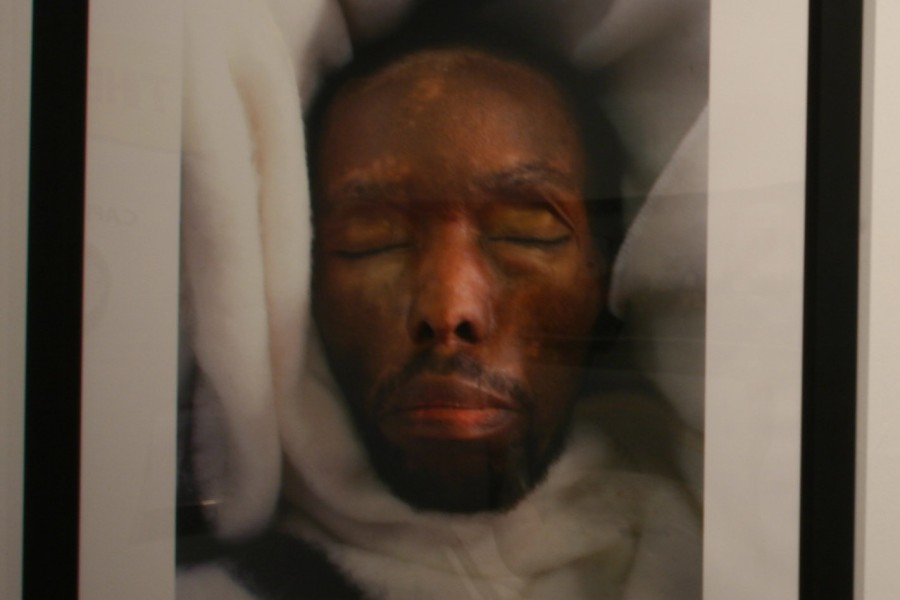 Pieter Hugo’s photograph of Monwabisi Mtana in his casket from *The Bereaved* series