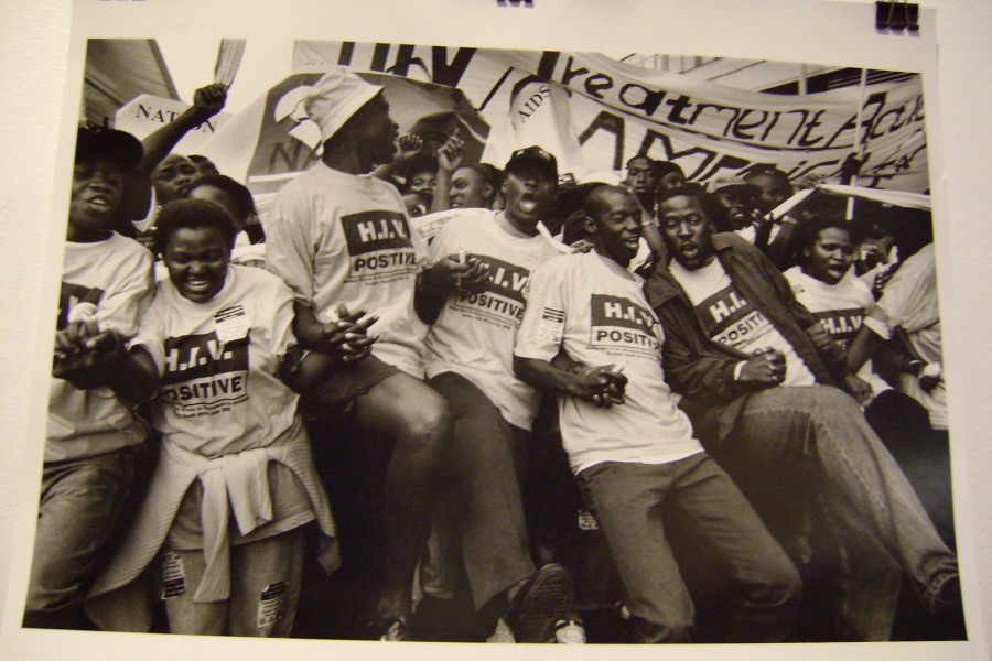 Gideon Mendel’s photograph *Breaking the Silence*