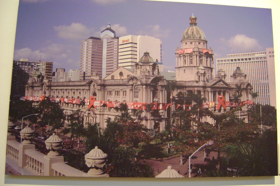 Angie Buckland’s photograph *Durban Art Gallery Red Ribbon installation*