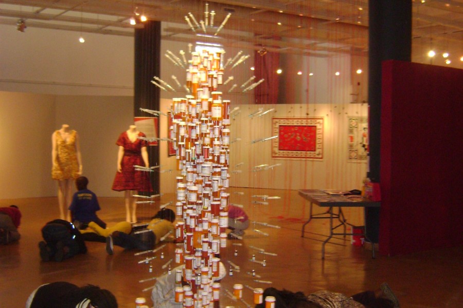 Visitors Writing around "Medicine Man" in the Not Alone Exhibit in South Africa