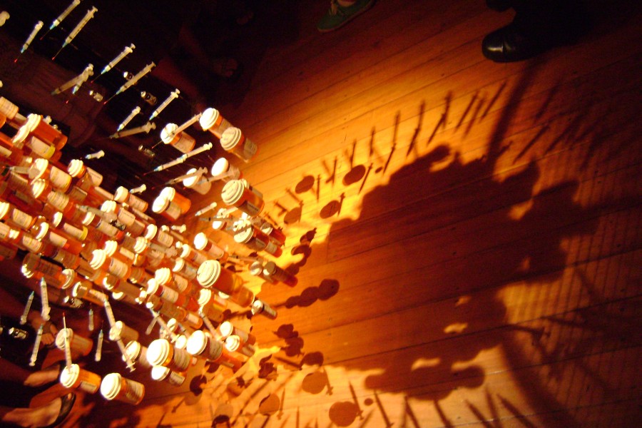 Shadow cast by Daniel Goldstein and John Kapellas’s *Medicine Man* across the gallery floor