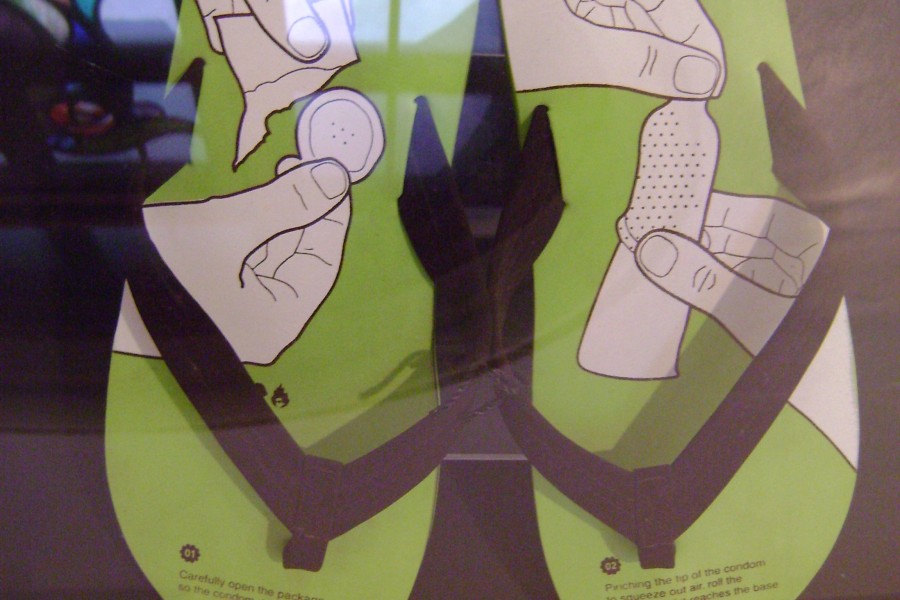 Thukral & Tagra’s *Condom Flip-Flops* displayed in the gallery