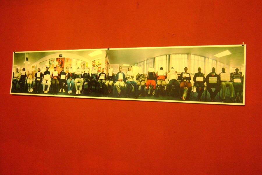 "The Harsh Divide: Treatment Action Campaign Office" by Gideon Mendel at Not Alone