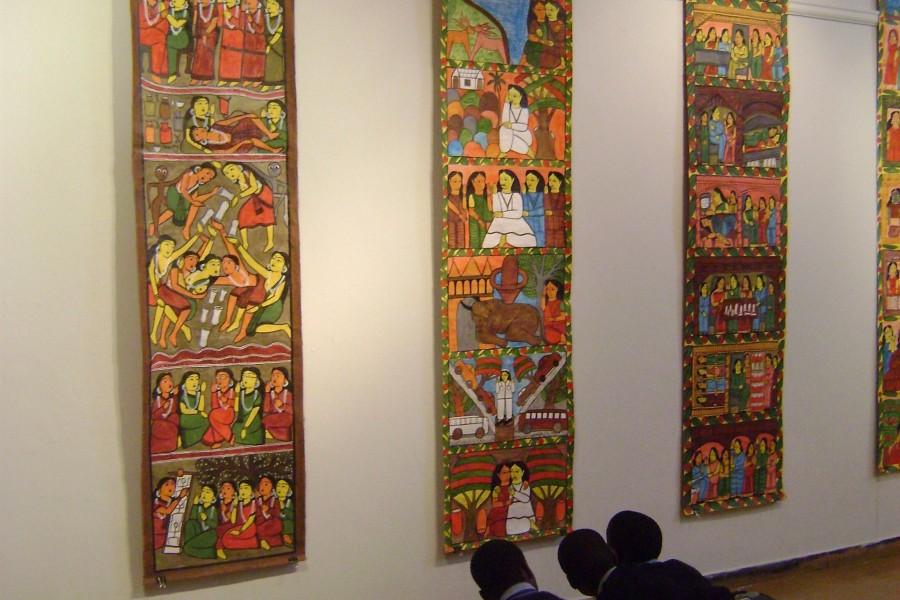 Visitors in the Not Alone Exhibit