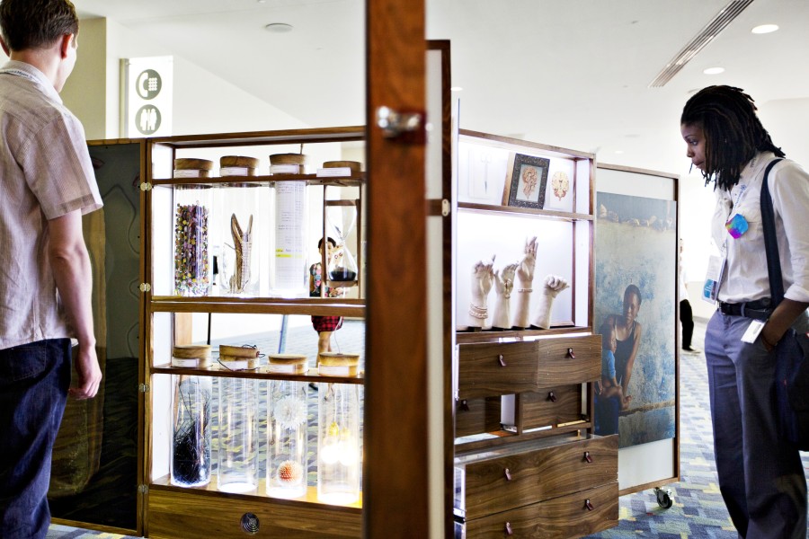 Visitors Obsering the A.R.T. Cabinet