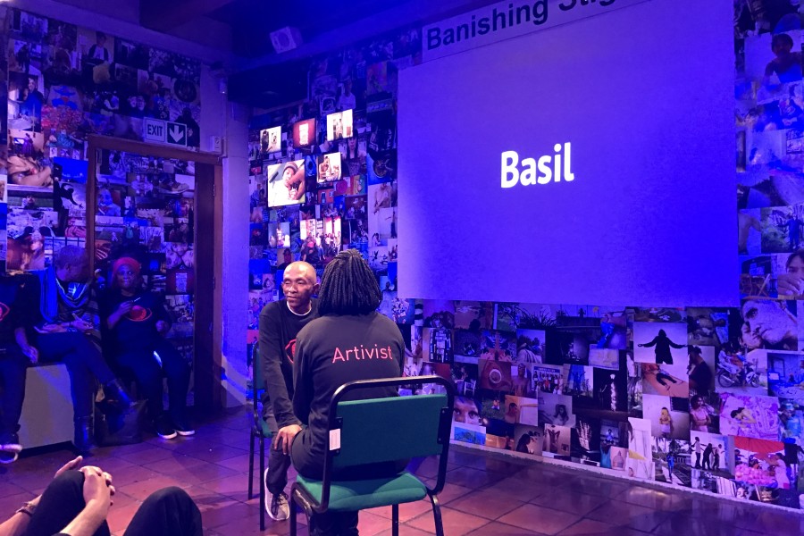 Through Positive Eyes artivist Basil sharing a personal story in the Banishing Stigma Room