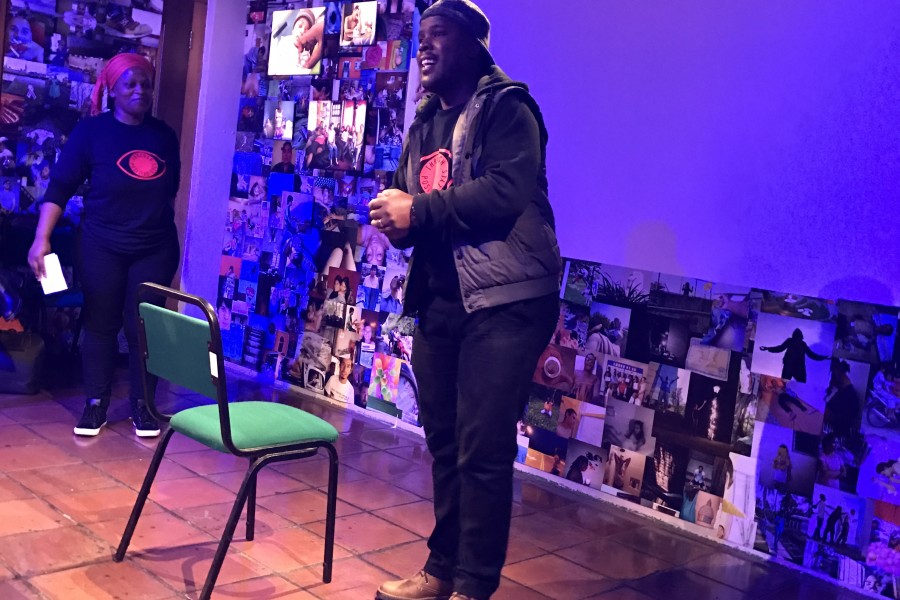 A Through Positive Eyes artivist sharing a personal story during live storytelling