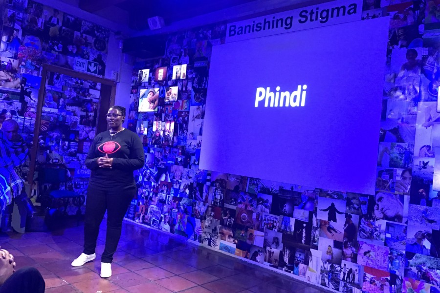 Through Positive Eyes artivist Phindi sharing a personal story in the Banishing Stigma Room