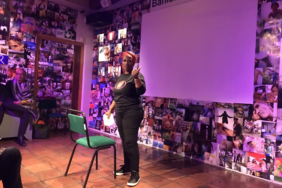 A Through Positive Eyes artivist sharing a personal story during live storytelling