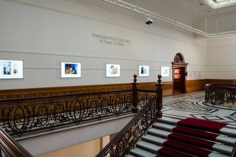 Central gallery displaying participant photographs and autobiographical texts