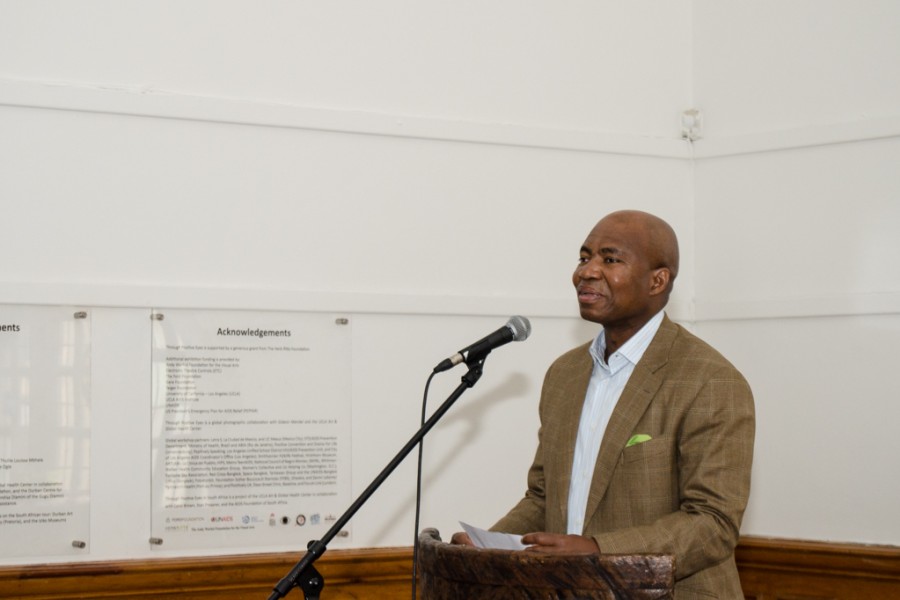 A person speaking during the exhibition opening