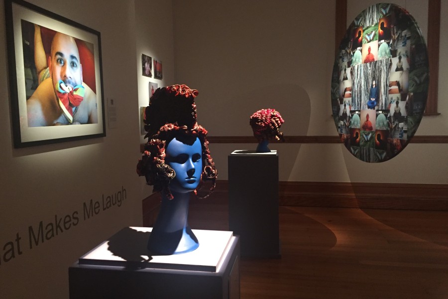 Isaac’s framed photograph and Adriana Bertini’s headdresses, with Daniel Goldstein’s meditation mandala to the right