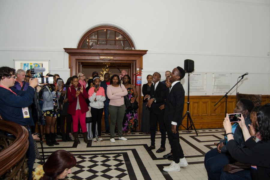Group performing at the exhibition opening