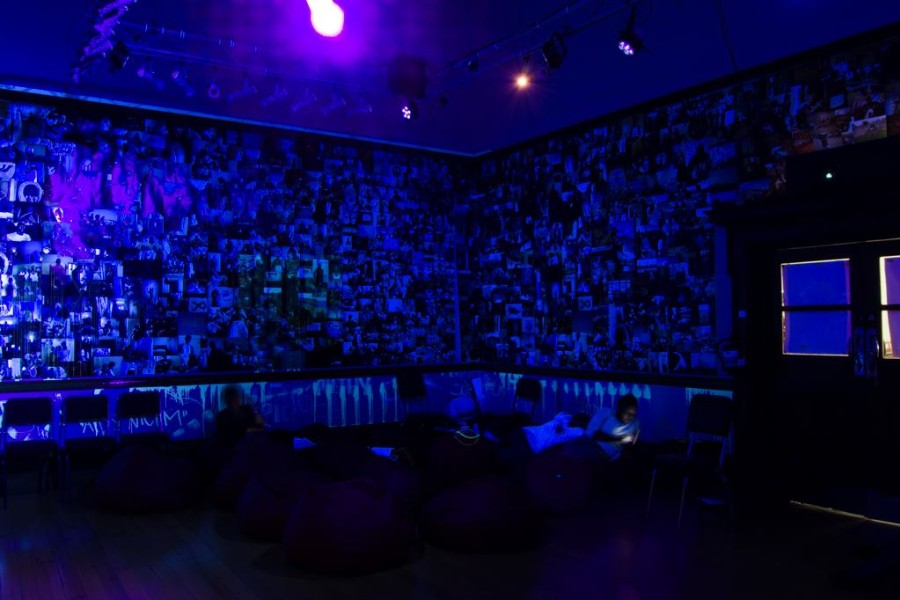 The gallery-and-theater installation of the Banishing Stigma Room