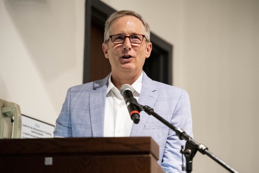 David Gere speaking at the exhibition opening