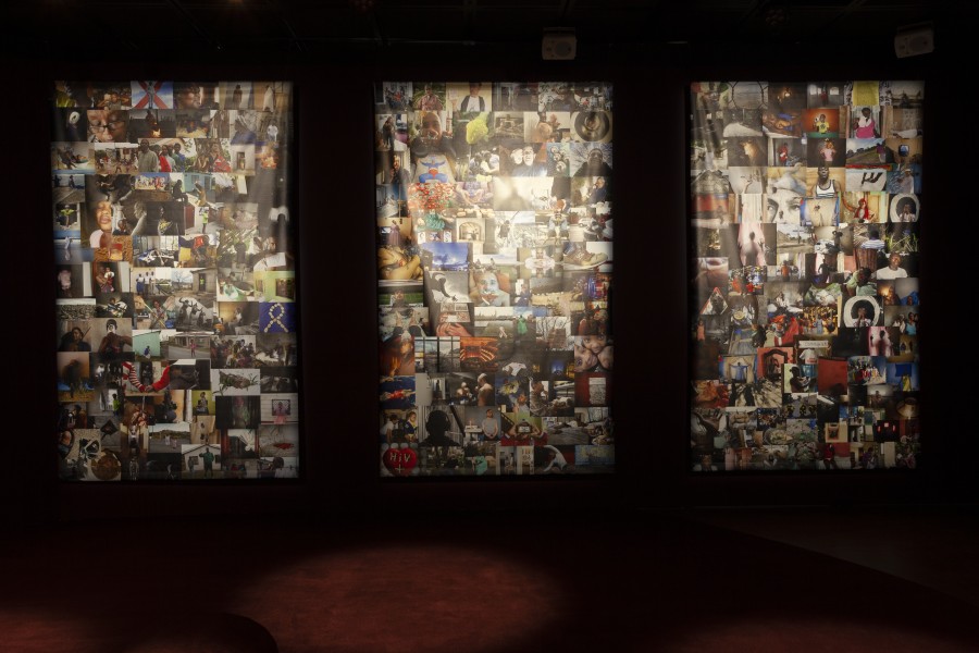 Three city photo-mosaic banners hanging in the Banishing Stigma Room