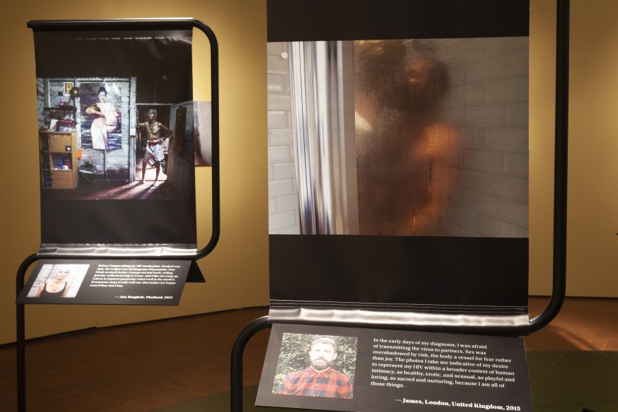 Displays for Aoi of Bangkok at left and James of London at right, with their photographs, stories, and portraits by Gideon Mendel