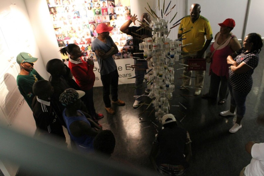 Visitors gathered around *Medicine Man*