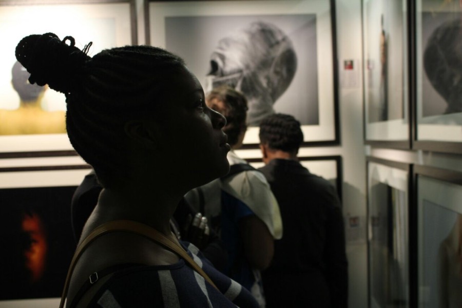 Visitor at Through Positive Eyes Johannesburg Exhibit