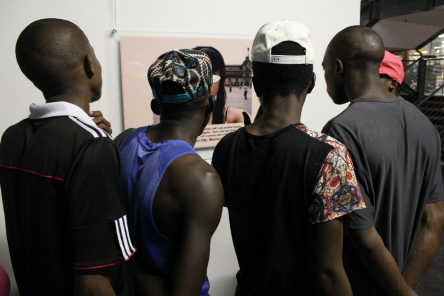 Visitor at Through Positive Eyes Johannesburg Exhibit
