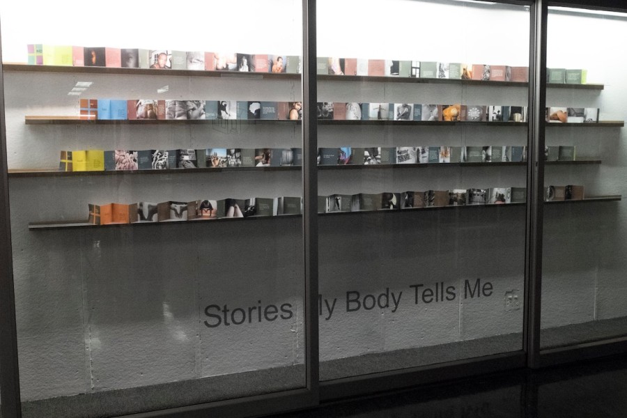 Parthiv Shah’s accordion book above the *Stories My Body Tells Me* section heading