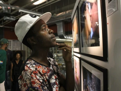 Visitor at Through Positive Eyes Johannesburg Exhibit