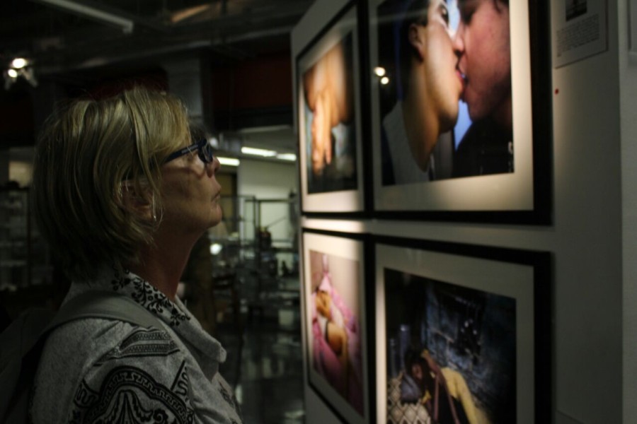 Visitor at Through Positive Eyes Johannesburg Exhibit