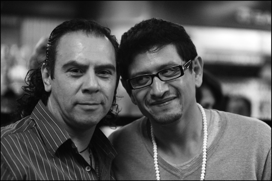 Through Positive Eyes artivist Roberto with another artivist at the exhibition