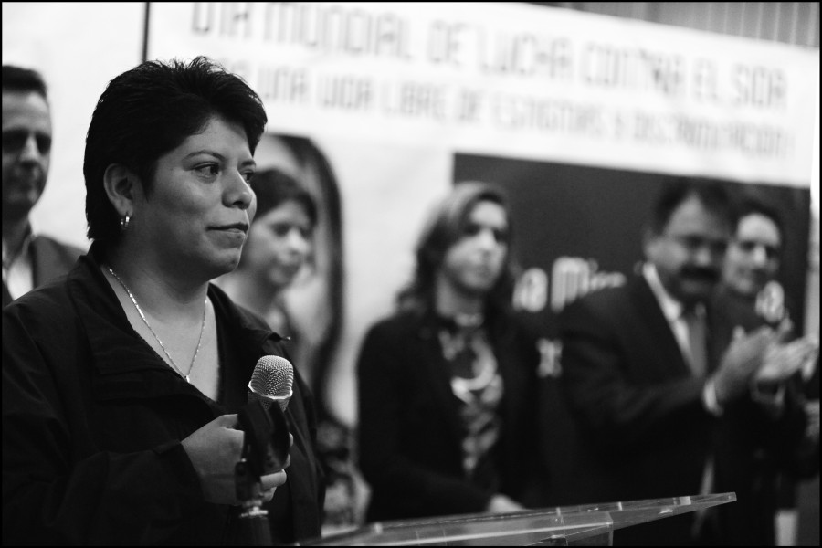 Through Positive Eyes artivist Silvia speaking at the exhibition opening